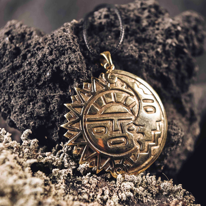 Antique bronze sun and moon amulet necklace, a mystical talisman symbolizing balance and offering protection, perfect as a magic item for anniversaries or as a spiritual safeguard