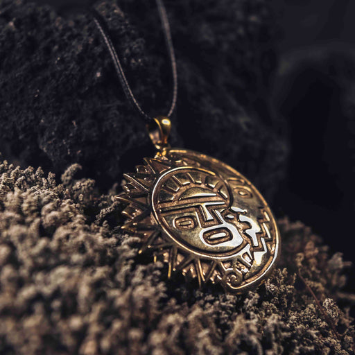 Antique bronze sun and moon amulet necklace, a mystical talisman symbolizing balance and offering protection, perfect as a magic item for anniversaries or as a spiritual safeguard
