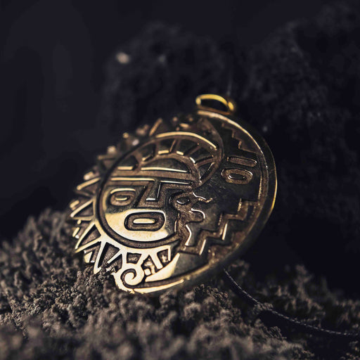 Antique bronze sun and moon amulet necklace, a mystical talisman symbolizing balance and offering protection, perfect as a magic item for anniversaries or as a spiritual safeguard