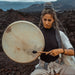 Hand-tuned tribal drum with intricately carved dragon handle, perfect for sound healing and spiritual ceremonies, crafted for a premium cosmic sound experience