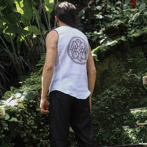 Perfectly blending the elements of yoga wear, gothic boho clothing, and shamanic attire, this pure cotton singlet is designed for both men and women seeking comfort and freedom