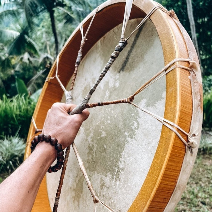 Hand-tuned tribal drum with intricately carved dragon handle, perfect for sound healing and spiritual ceremonies, crafted for a premium cosmic sound experience