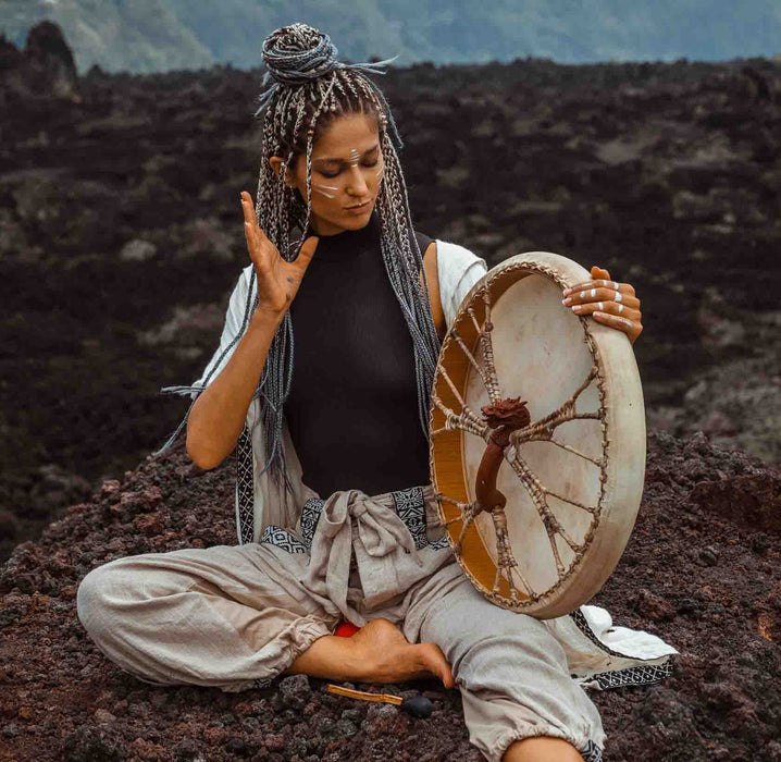 Hand-tuned tribal drum with intricately carved dragon handle, perfect for sound healing and spiritual ceremonies, crafted for a premium cosmic sound experience