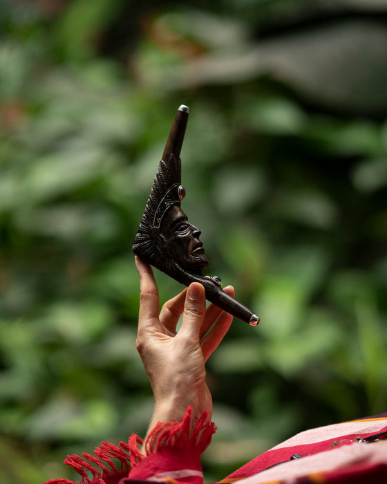 Carved Tepi pipe with an Indian face design, used as a traditional hape snuff applicator, a handcrafted smoking tool for mapacho and herbs, serves as a unique protective kit